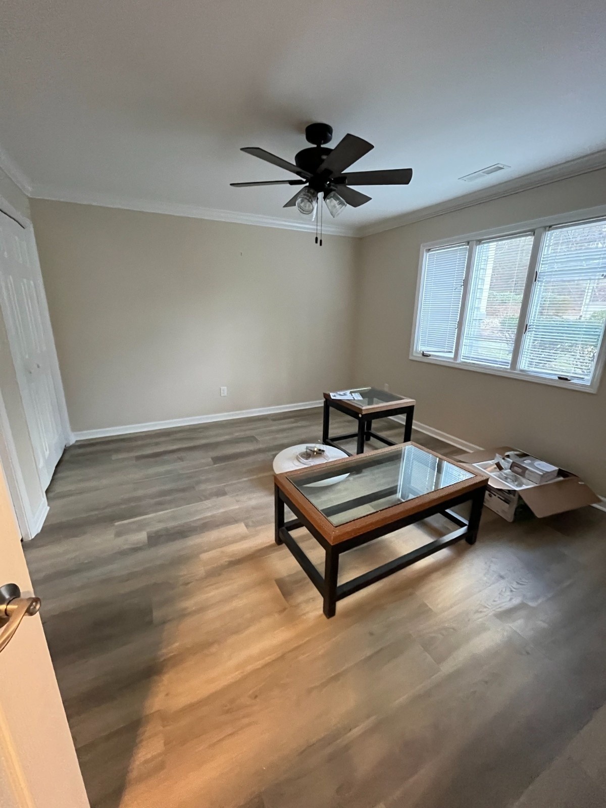 A2 Painting living room interior repaint neutral greige walls white crown molding Hendersonville NC