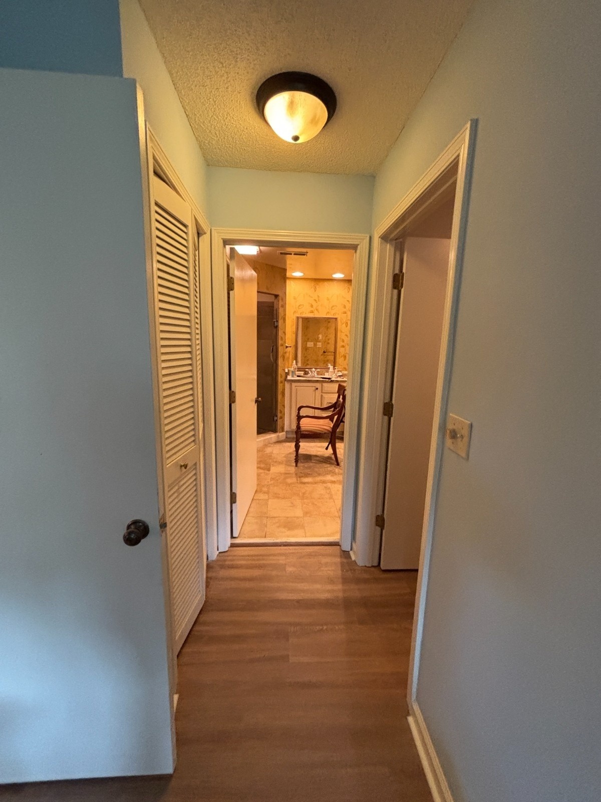 A2 Painting hallway interior repaint with white trim and soft blue walls Hendersonville NC