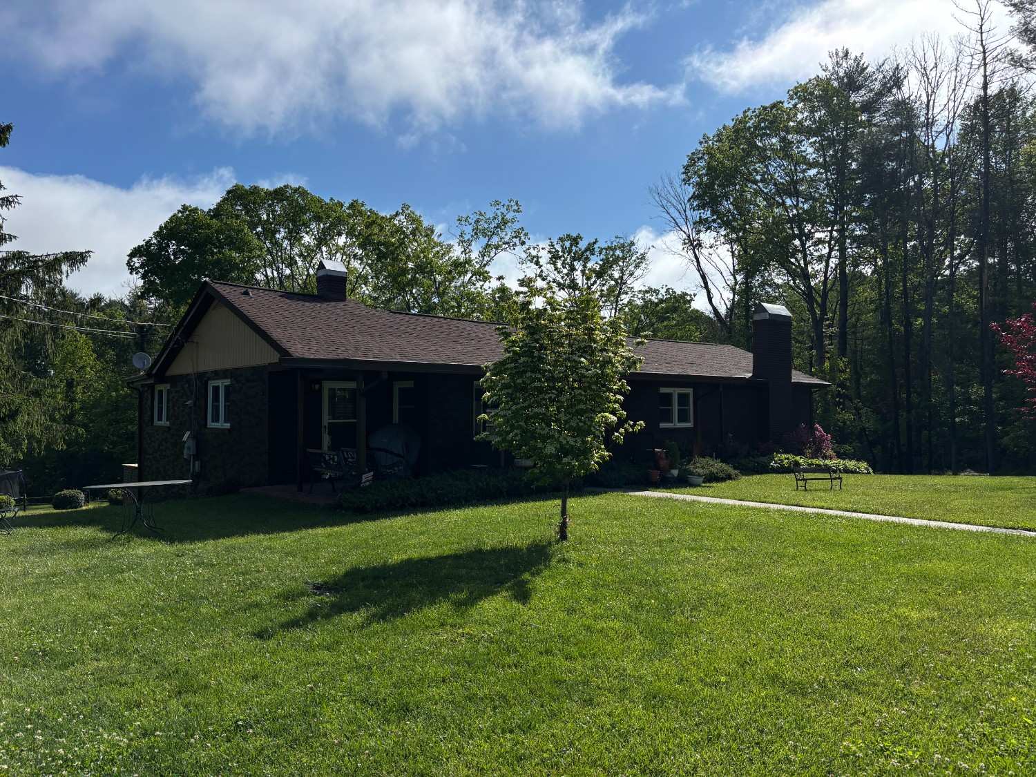 dark exterior repaint on single story ranch home Henderson County NC
