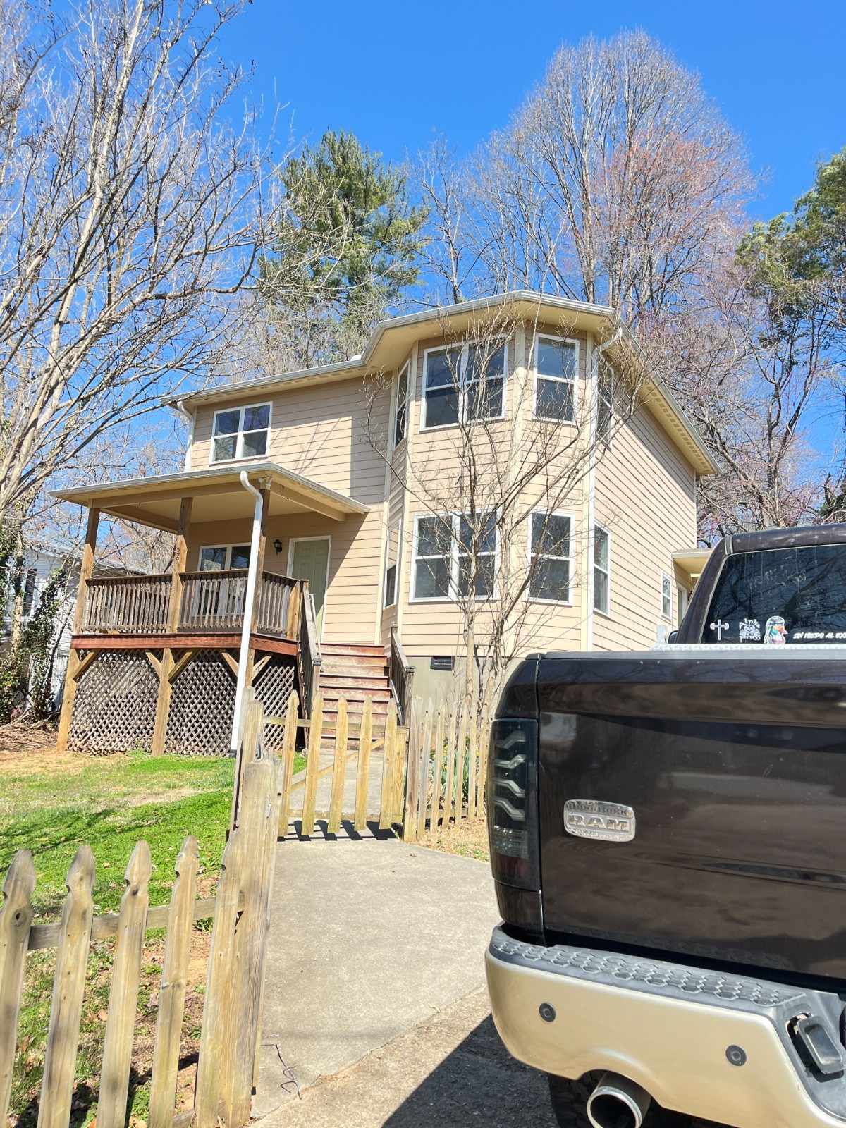 A2 Painting beige vinyl siding repaint on two story Hendersonville NC home