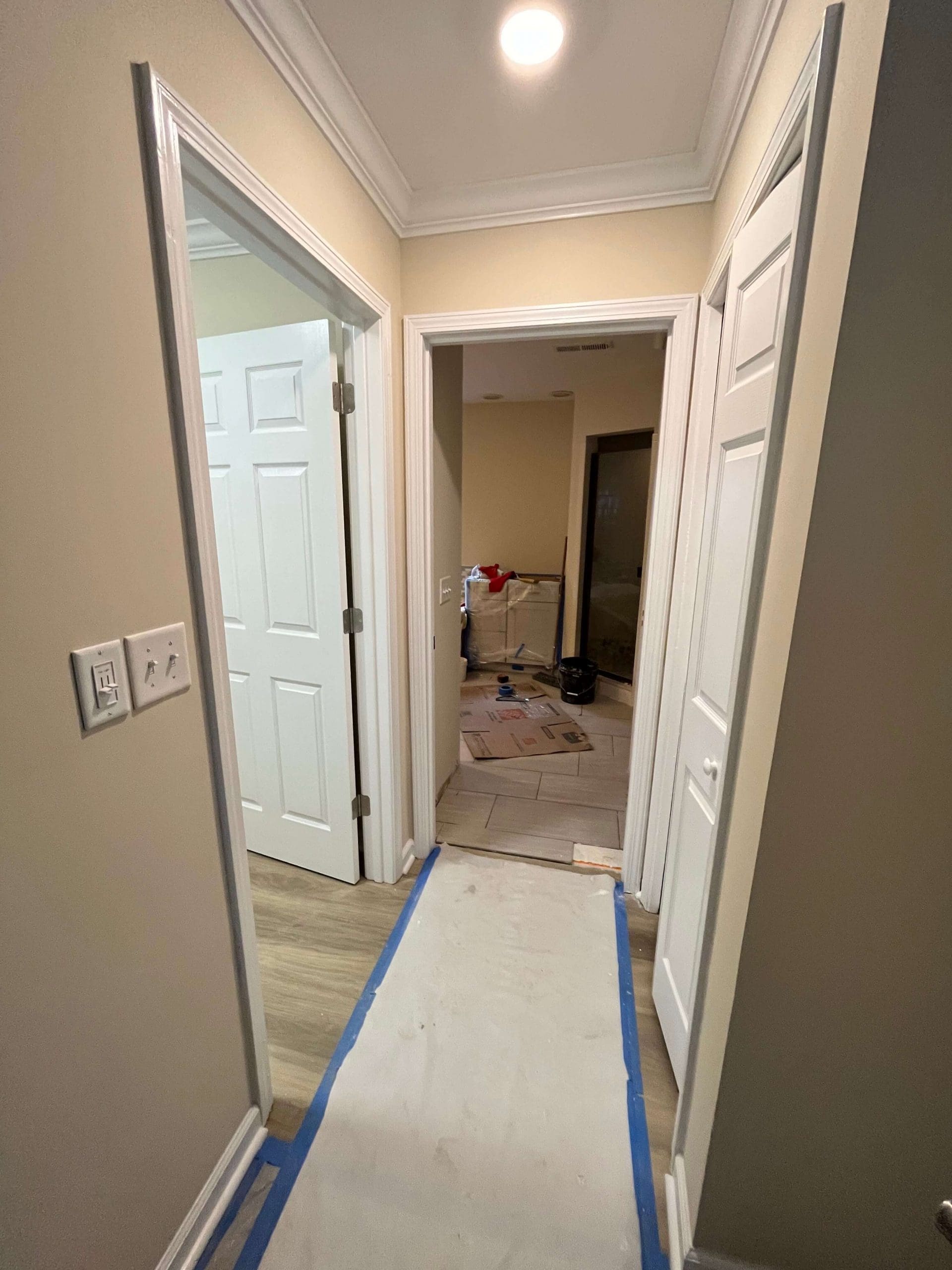 Hallway walls repainted with masked floors by wall painters in Hendersonville, NC